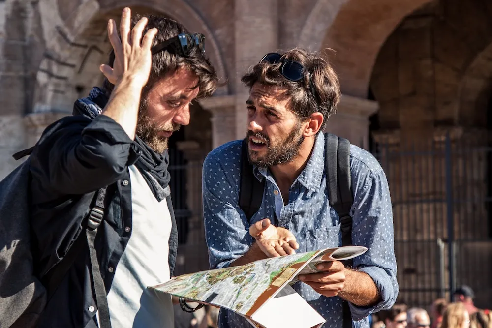Confused language learner struggling to understand native speaker abroad